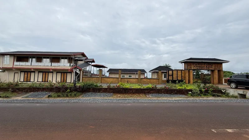The finished Eco-Living Oasis at Kent from the road: main building, gatehouse and planted frontage